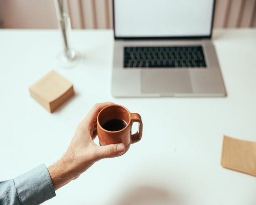 cup of coffee on a calm work desk